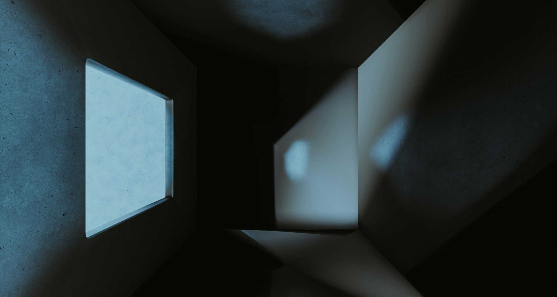 ein-dunkler-raum-mit-einem-kleinen-fenster-darin-TnXu7ib-d6Q