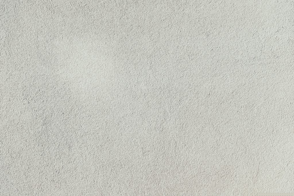 eine-nahaufnahme-einer-weissen-stuckwand-hQ3WZnY3yZ0