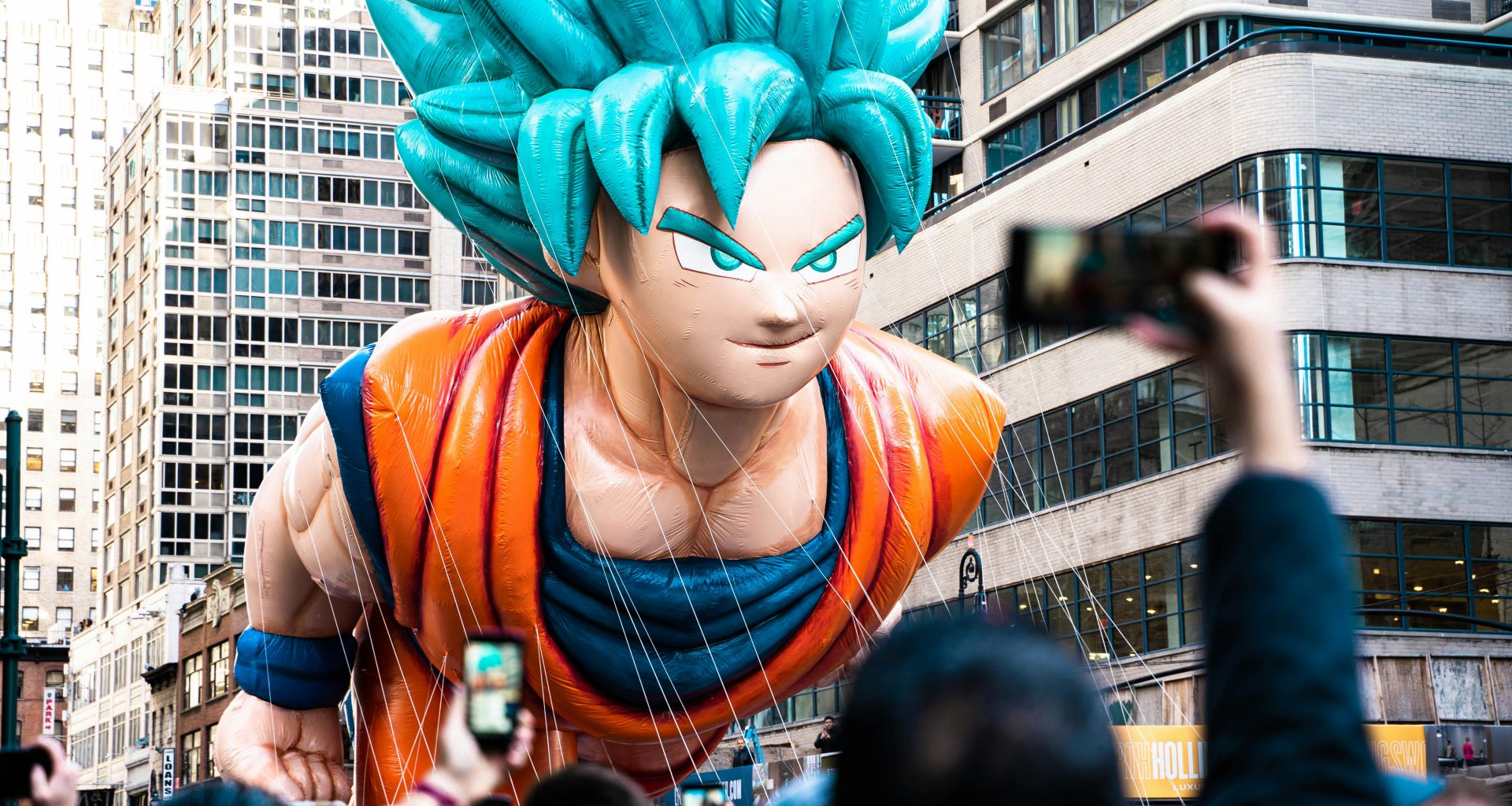 a-large-balloon-of-a-dragon-is-being-held-up-in-the-air-YavHUvSfOQw