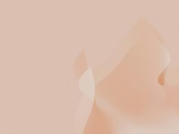 ein-rosafarbener-hintergrund-mit-einem-verschwommenen-muster-IXWVY7MDkSs