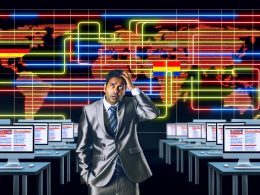 Moderne Schaltzentrale mit Monitoren, die komplexe Website-Strukturen und Hreflang-Fehlercodes im internationalen SEO zeigen. Sichtbare Länderflaggen, Subfolder und ein verzweifelter Mitarbeiter verdeutlichen die Herausforderungen der Hreflang-Implementierung.