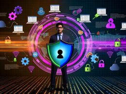 Team bespricht Datentracking-Strategien vor Whiteboard mit bunten Notizen, während Laptops Dashboards und Analytics zeigen, High-Tech-Equipment und große Monitore im modernen Büro.