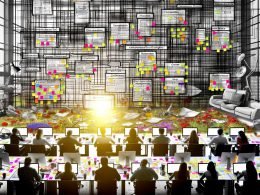 UX/UI-Spezialist:innen entwickeln gemeinsam komplexe Webstrukturen vor einem großen Bildschirm voller Diagramme und Flussdiagramme in einem modernen Arbeitsumfeld.