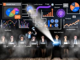 Team im dunklen Raum analysiert bunte Charts und Datenströme – Fokus auf Klarheit und Wachstum mithilfe von Analytics.