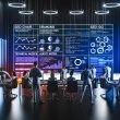 Team arbeitet konzentriert an digitalem Whiteboard mit SEO-Analysen, Ranking-Grafiken und technischen Notizen in einem modernen Büro voller Bildschirme.