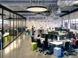 Modernes, industrielles KI-Büro mit diversen Teams; Dual‑Monitore mit Code und Datenvisualisierungen, Glas-Meetingräume, sichtbare GPU‑Racks, Whiteboards mit Diagrammen; Laptops mit Kubernetes-, Ray- und MLflow‑Stickern; Dashboard mit Metriken/Compliance/Model‑Health; Wandmotto „Build Real AI. No Excuses.“
