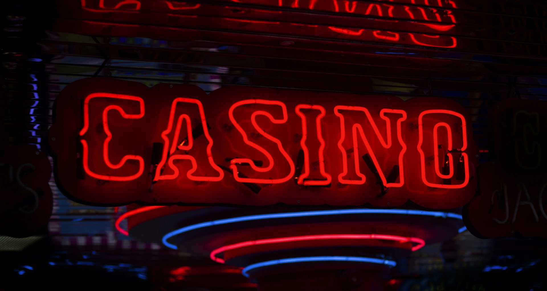 red-casino-neon-sign-turned-on-bYtIpXnzsQM
