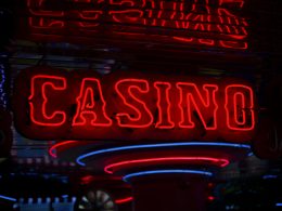 red-casino-neon-sign-turned-on-bYtIpXnzsQM