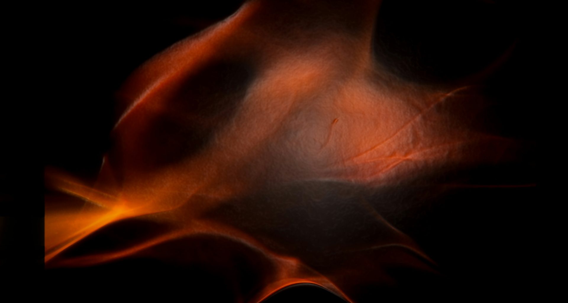 ein-verschwommenes-bild-eines-feuers-in-der-dunkelheit-knmIddg0GeQ