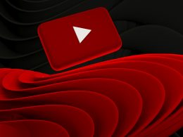 ein-roter-und-schwarzer-hintergrund-mit-einem-weissen-pfeil-RiOBIDBYjsA