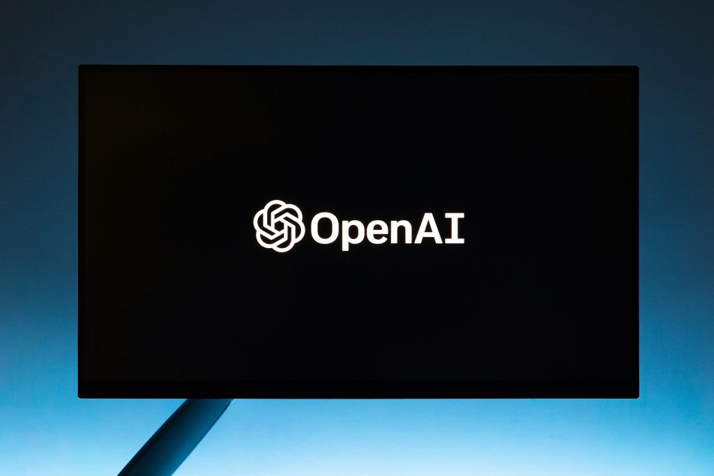 das-open-ai-logo-wird-auf-einem-computerbildschirm-angezeigt-hZkOZGtlA5w