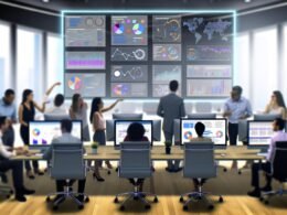 Multikulturelles Marketingteam bespricht detaillierte Datenvisualisierungen und Leistungskennzahlen an mehreren digitalen Bildschirmen in einem modernen Arbeitsraum.