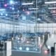 Futuristisches, offenes Marketingbüro voller leuchtender Datenströme, schwimmender Dashboards und Marketer, die mit KI-Interfaces und digitalen Datenwänden arbeiten.