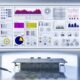 Modernes Daten-Dashboard mit bunten Diagrammen, Drilldown-Filtern und Sicherheitssymbolen in einem minimalistischen Büro.