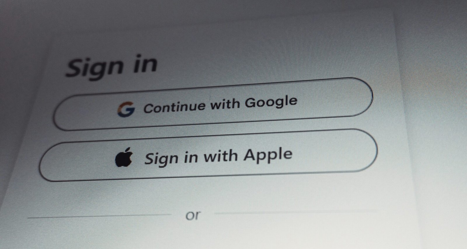 Anmeldebildschirm mit Auswahloptionen für Google- und Apple-Konten zur schnellen und einfachen Registrierung