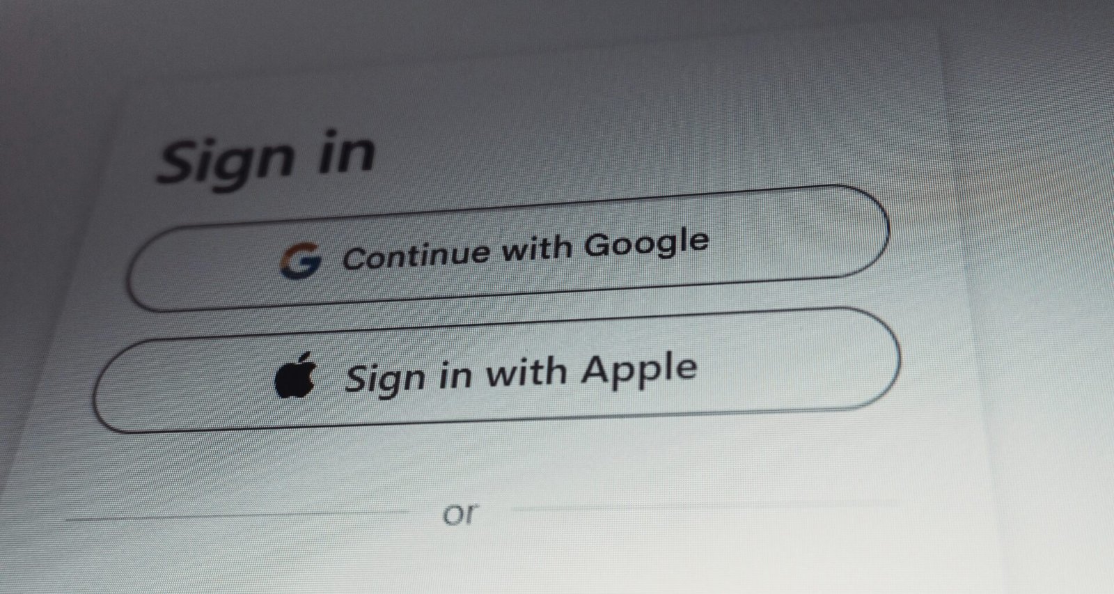 Benutzeroberfläche mit Auswahl zur Anmeldung über Google- oder Apple-Konten, Sign-in-Optionen digital dargestellt