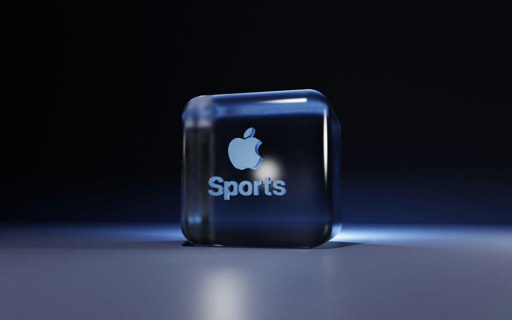 Apple Sportlogo leuchtet auf einem dunklen Hintergrund, aufgenommen von BoliviaInteligente, Symbol für Technologie und Innovation