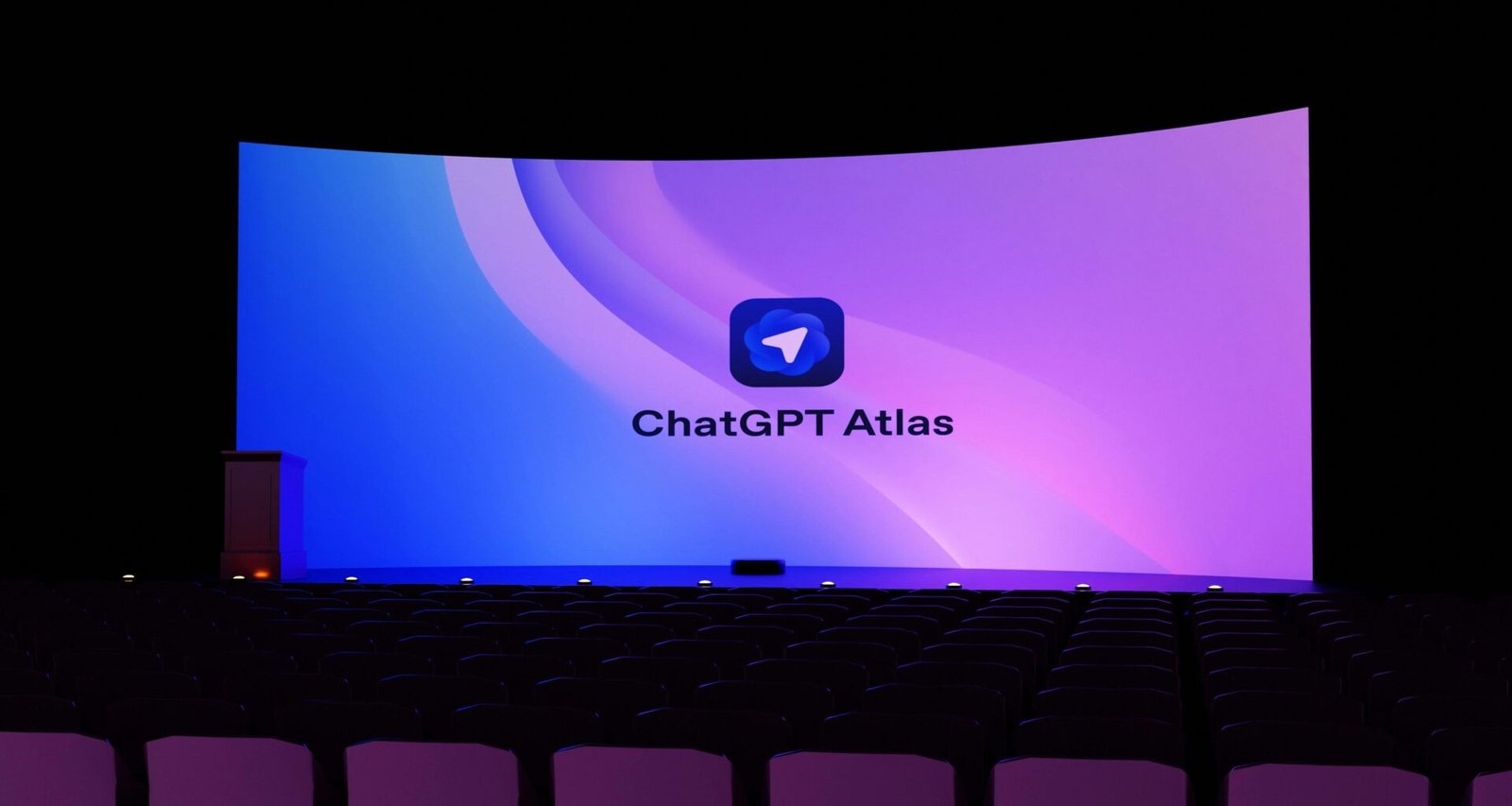 Ein großer Bildschirm zeigt das ChatGPT Atlas Logo deutlich im Zentrum auf schwarzem Hintergrund.