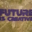 Auf einer Wand steht in großen Buchstaben der Spruch 'future is creative' aufgemalt – Symbol für innovative Ideen.