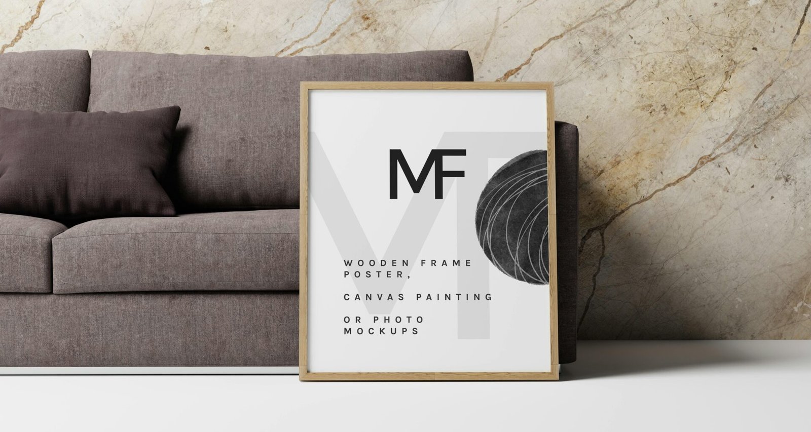 Ein leerer Bilderrahmen lehnt an einer Wand direkt neben einem gemütlichen Sofa auf einem Holzboden.