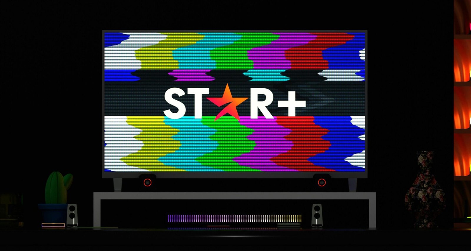 Ein großer Fernsehbildschirm mit einem leuchtenden Stern als Symbol auf dunklem Hintergrund im Raum.