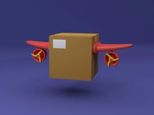 Kartonbox mit rotem Propeller, seitlich angebracht, auf neutralem Hintergrund aufgenommen