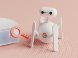 Ein kleiner weißer Roboter steht neben einem kleinen weißen Radio auf einer ebenen Oberfläche