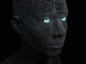 Mann mit blauen Augen blickt direkt in die Kamera, Hintergrund ist schwarz gehalten, Nahaufnahme