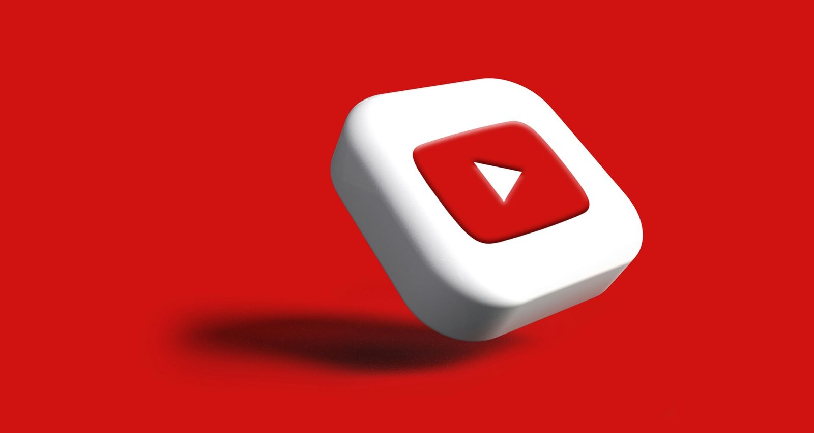 Ein weißer Würfel mit rotem Pfeil, platziert auf einem kräftig roten Hintergrund, dient als Symbol für Richtung im Design-Kontext.