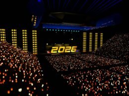 Eine vollbesetzte Arena mit jubelnden Konzertbesuchern während eines großen Events im Jahr 2026.