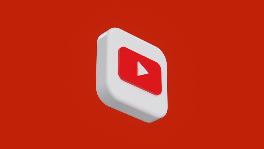 Rotes und weißes Play-Button-Symbol auf einfarbig rotem Hintergrund, ideal für Online-Marketing-Artikel.