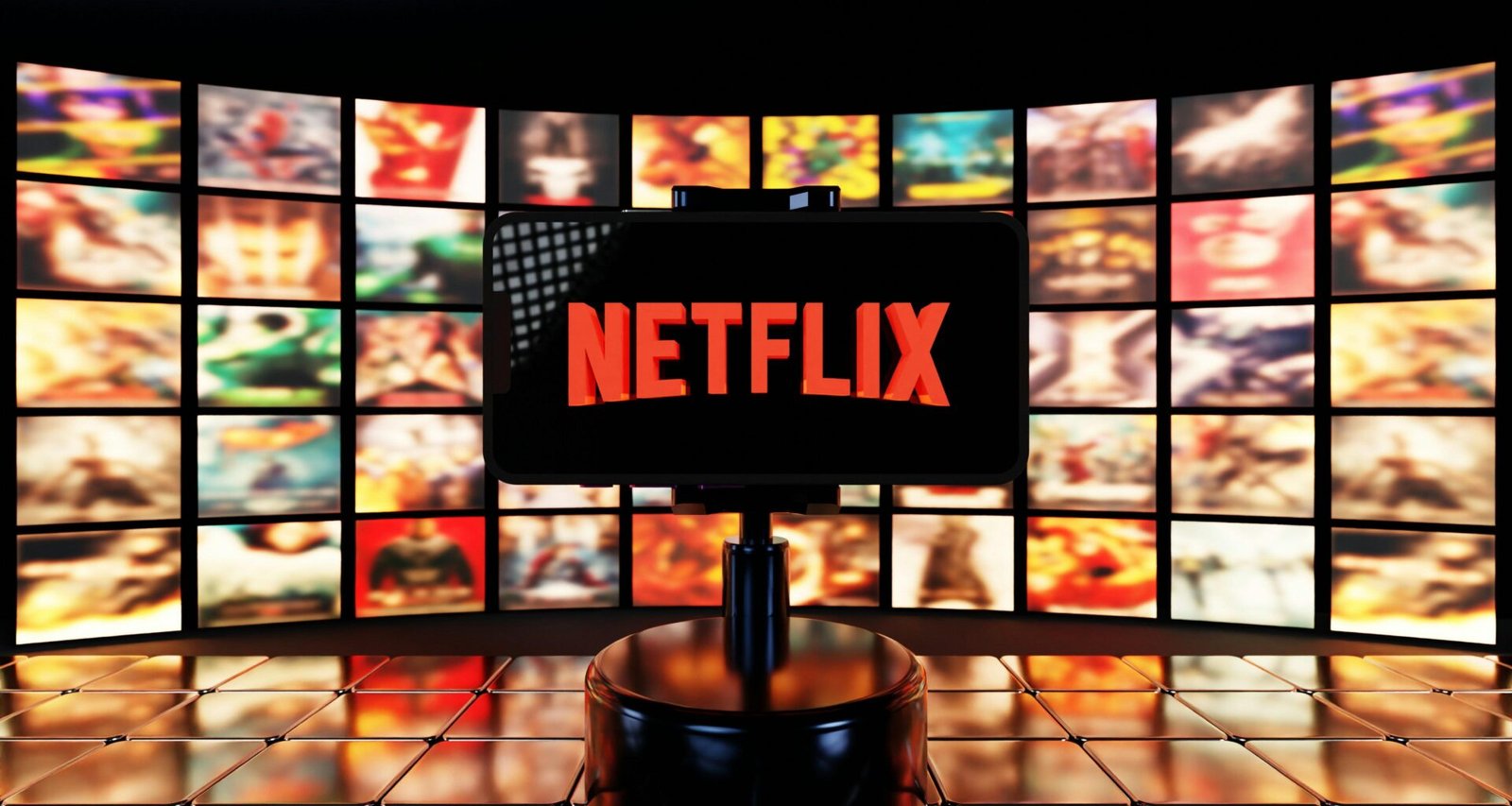 Das Netflix Logo ist auf einem Bildschirm mit mehreren Filmplakaten im Hintergrund zu sehen.