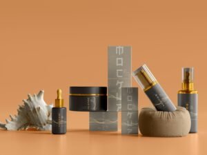 Zwei schwarze Tuben mit goldenen Akzenten stehend nebeneinander auf hellem Hintergrund, geeignet für Produktfotografie-Artikel.