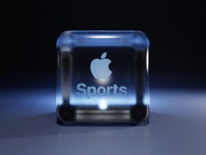 Ein Apple Sportlogo, das auf der Oberfläche eines leuchtenden Würfels zu sehen ist, aufgenommen auf neutralem Hintergrund.