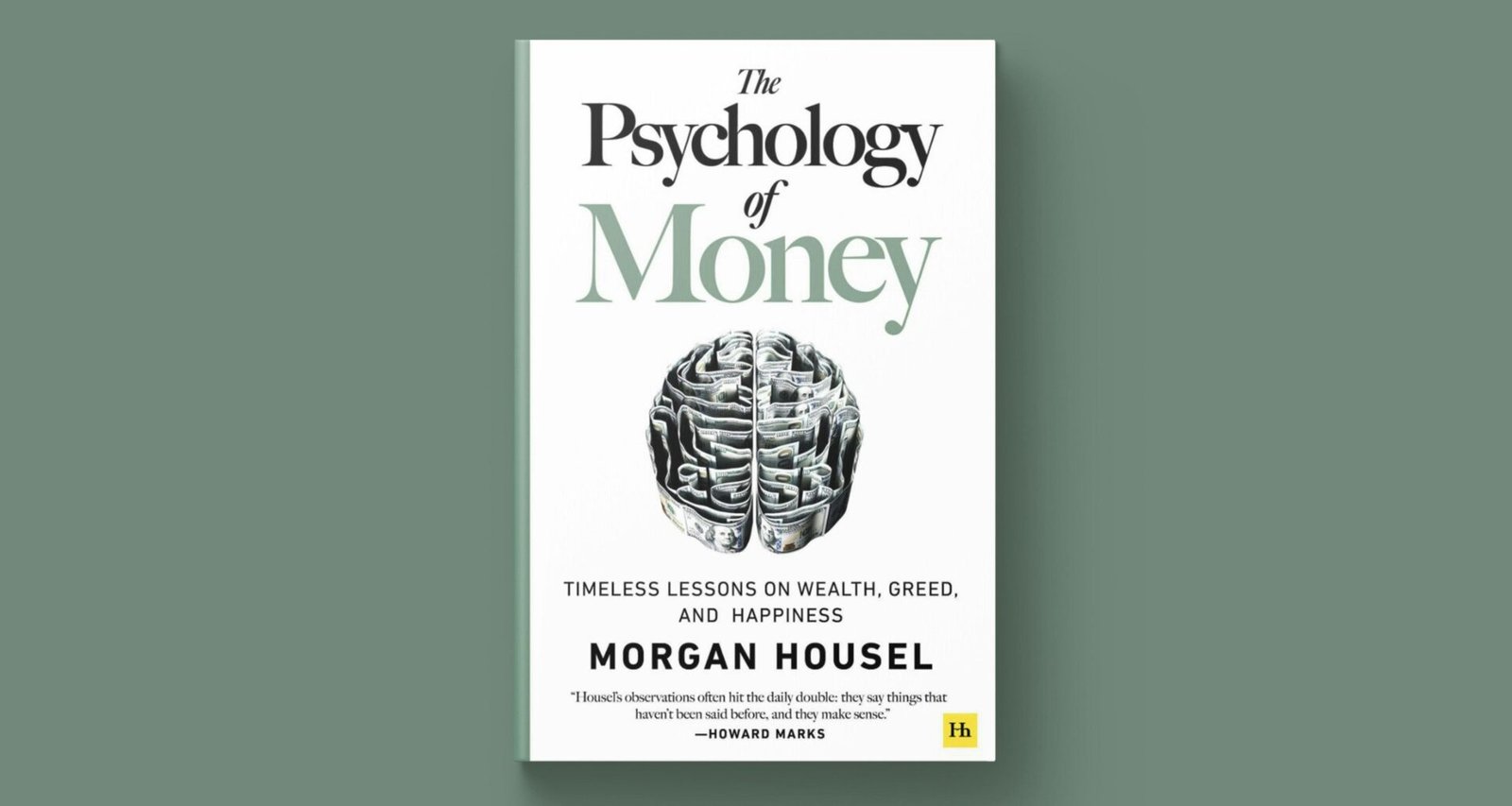 Buchcover von 'Die Psychologie des Geldes' von Morgan Housel, abgebildet auf einer hellen Oberfläche