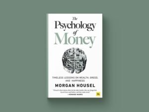 Buchcover von 'Die Psychologie des Geldes' von Morgan Housel, abgebildet auf einer hellen Oberfläche