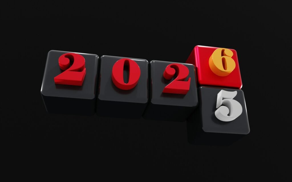 Holzblöcke mit den Zahlen 2025 und 2026, die den Übergang zwischen den Jahren symbolisieren