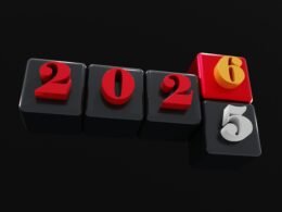 Holzblöcke mit den Zahlen 2025 und 2026, die den Übergang zwischen den Jahren symbolisieren