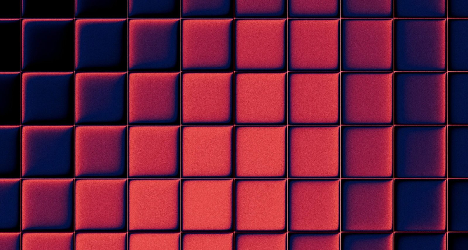 Ein Gitter aus roten und blauen Quadraten mit Schattenwurf, abstrakt fotografiert auf unsplash.com